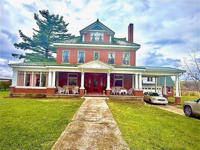 Spacious Three-Story Brick Home Ready for Your Vision in Salisbury, PA