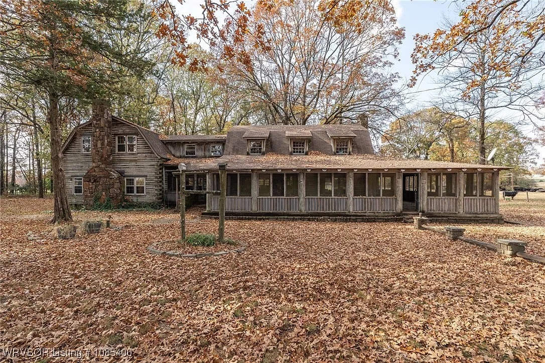 Stunning Log Estate with Private Runway and Wide Open Land