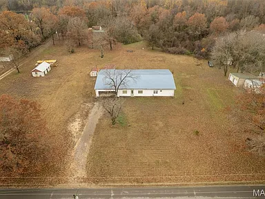 Spacious Ranch-Style Country Home with Outbuildings in Benton, Missouri