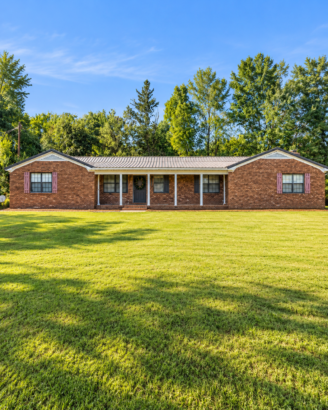 Charming Country Brick Home with Great Potential in Batesville, Mississippi